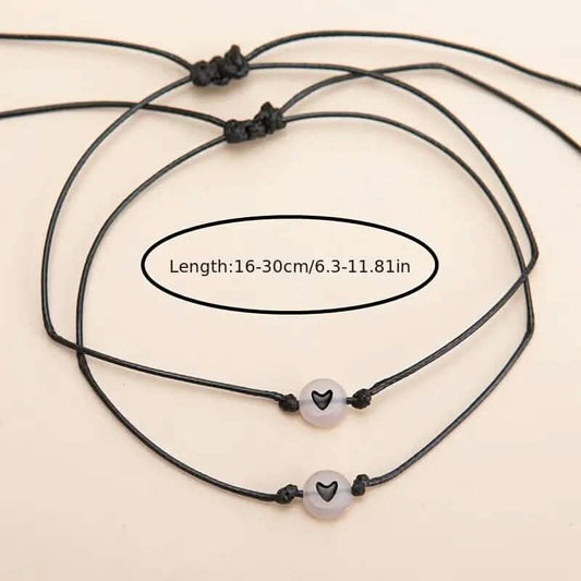 2-Pieces: Luminous Flat Round Shape Beads Braided Bracelet with Heart Shape Pattern DailySale