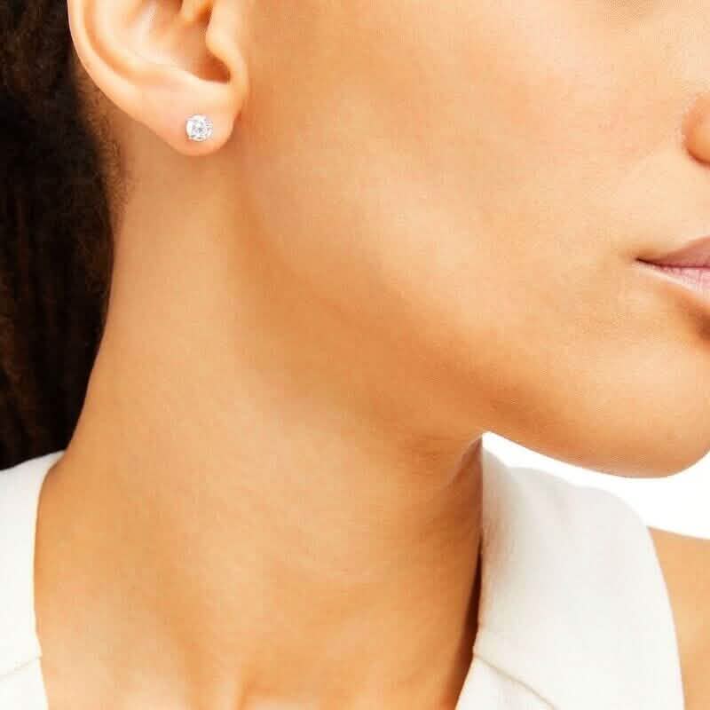 0.25 Ct T.W. Natural Diamond Studs in 14k White or Yellow Gold DailySale
