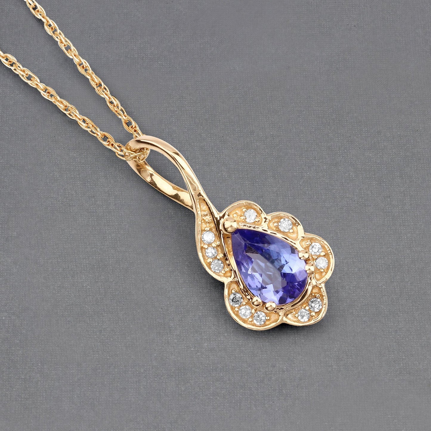 0.40 Carat Genuine Tanzanite and White Diamond 14K Yellow Gold Pendant Bids.com