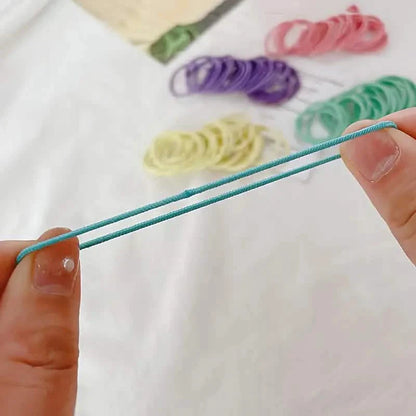100-Pieces: High Elastic Leather Hair Rope Ponytail Bands - Seamless DailySale
