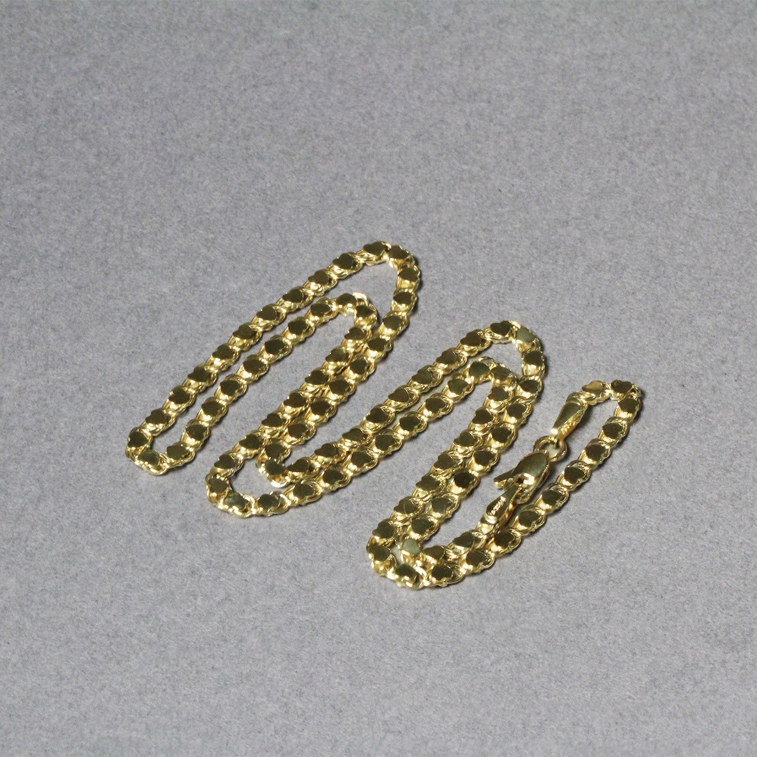 2.9mm 14k Yellow Gold Heart Chain Bids.com