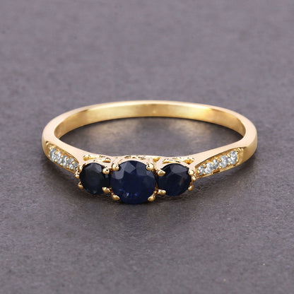 0.56 Carat Genuine Blue Sapphire and White Diamond 14K Yellow Gold Ring Bids.com