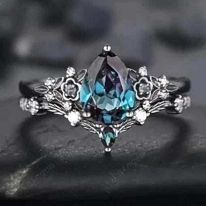 2-Piece Set: Gothic Black & Golden Engagement Ring Set with Pear-Shaped Cubic Zirconia DailySale