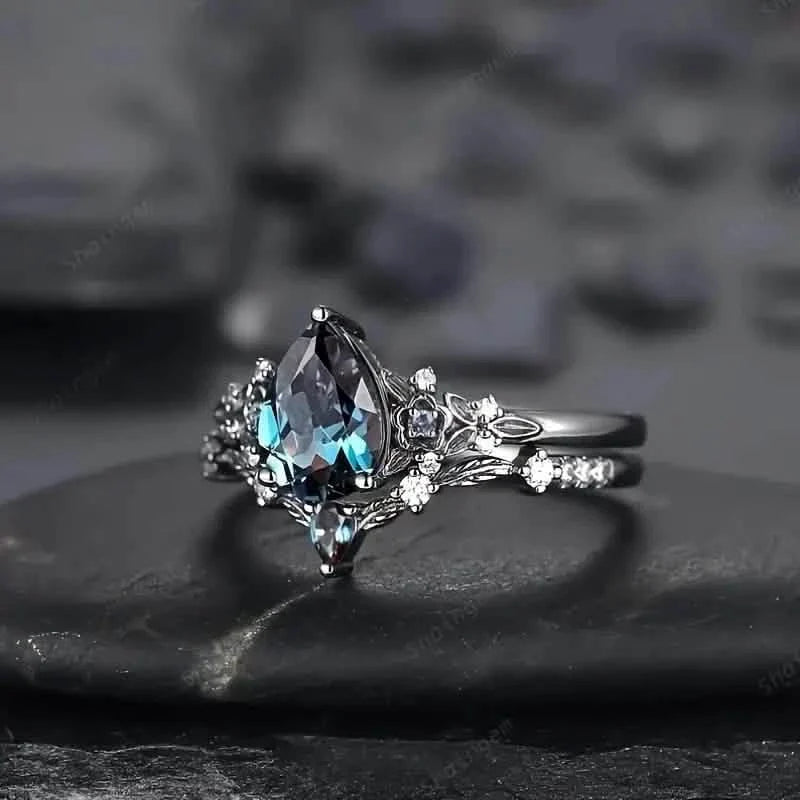 2-Piece Set: Gothic Black & Golden Engagement Ring Set with Pear-Shaped Cubic Zirconia DailySale