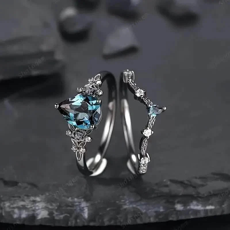 2-Piece Set: Gothic Black & Golden Engagement Ring Set with Pear-Shaped Cubic Zirconia DailySale