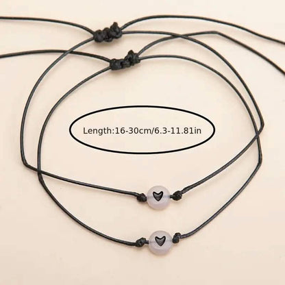 2-Pieces: Luminous Flat Round Shape Beads Braided Bracelet with Heart Shape Pattern DailySale