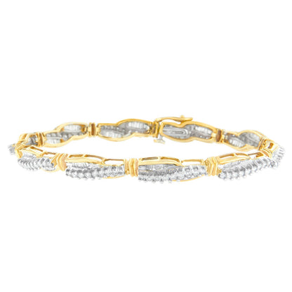 14K Yellow Gold Round and Baguette Cut Winding Love Diamond Bracelet (3.00 cttw, H-I Color, SI1-SI2 Clarity) Bids.com