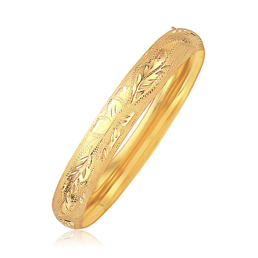 Classic Floral Carved Bangle in 14k Yellow Gold (10.0mm) Bids.com