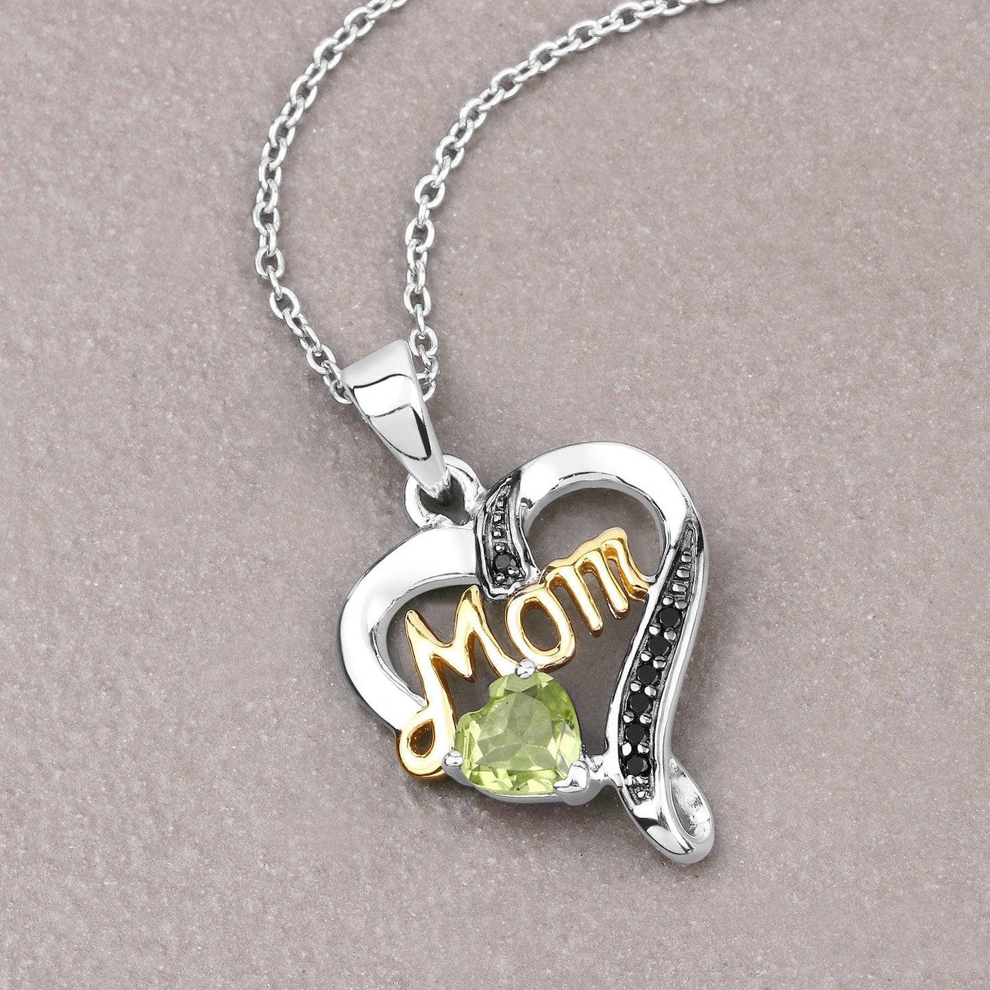0.49 Carat Genuine Peridot and Black Spinel .925 Sterling Silver Pendant Bids.com