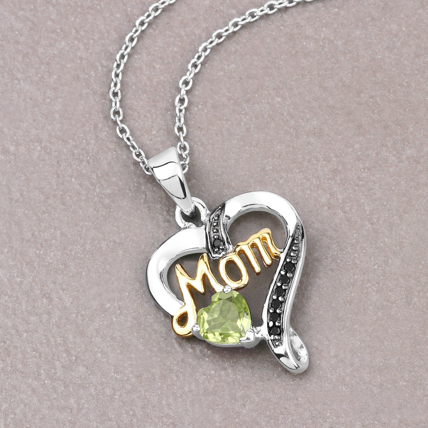 0.49 Carat Genuine Peridot and Black Spinel .925 Sterling Silver Pendant Bids.com