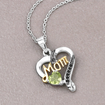 0.49 Carat Genuine Peridot and Black Spinel .925 Sterling Silver Pendant Bids.com