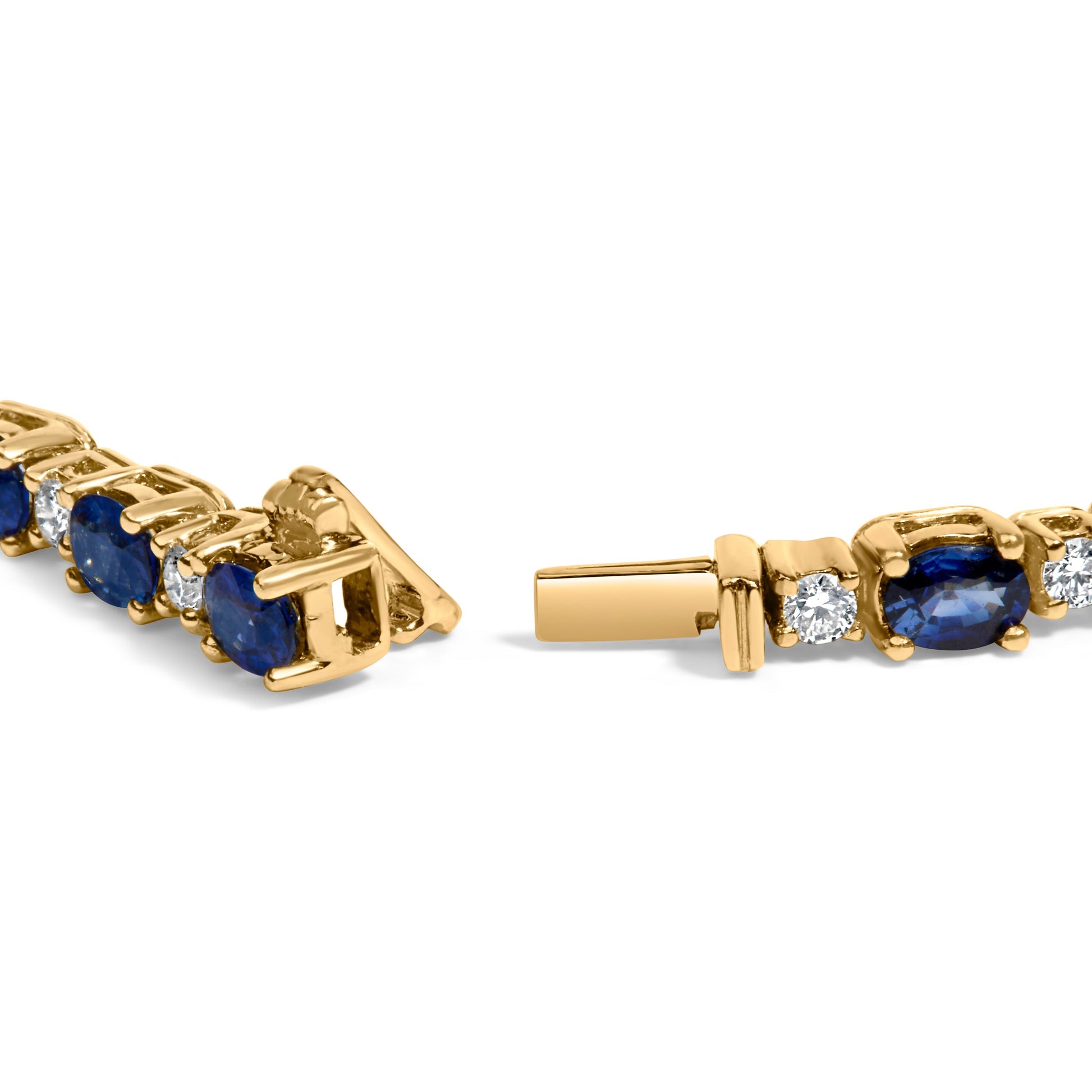 18K Yellow Gold 3/4 Cttw Diamond and 5 1/3 Cttw Oval Blue Sapphire Alternating Link Bracelet (G-H Color, VS1-VS2 Clarity)  - 7.25" Inches Bids.com
