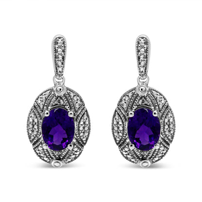 .925 Sterling Silver Diamond Accent and 8x6mm Purple Oval Amethyst Stud Earrings (I-J Color, I1-I2 Clarity) Bids.com