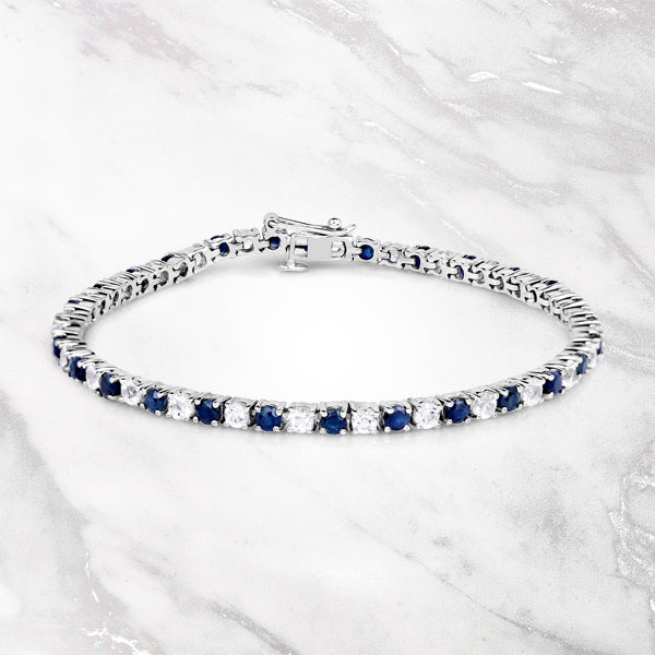 6.87 ct. t.w. Blue Sapphire and White Topaz Bracelet in Sterling Silver Bids.com