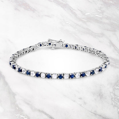 6.87 ct. t.w. Blue Sapphire and White Topaz Bracelet in Sterling Silver Bids.com