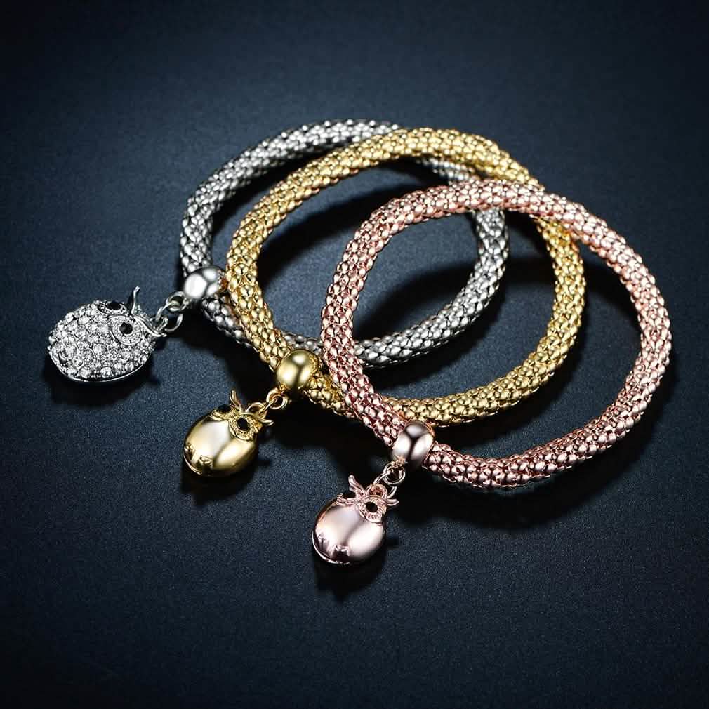 3-Piece: 18K Tri-Tone Owl Charm Stretch Popcorn Bracelet Set DailySale