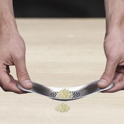 3-Piece Set: Stainless Steel Garlic Crusher Press and Peeler with Cleaning Brush DailySale