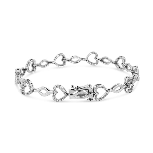 .925 Sterling Silver 1/4 Cttw Round-Cut Diamond Alternating Heart and Leaf Link Bracelet (I-J Color, I3 Clarity) - Size 7.25" Bids.com