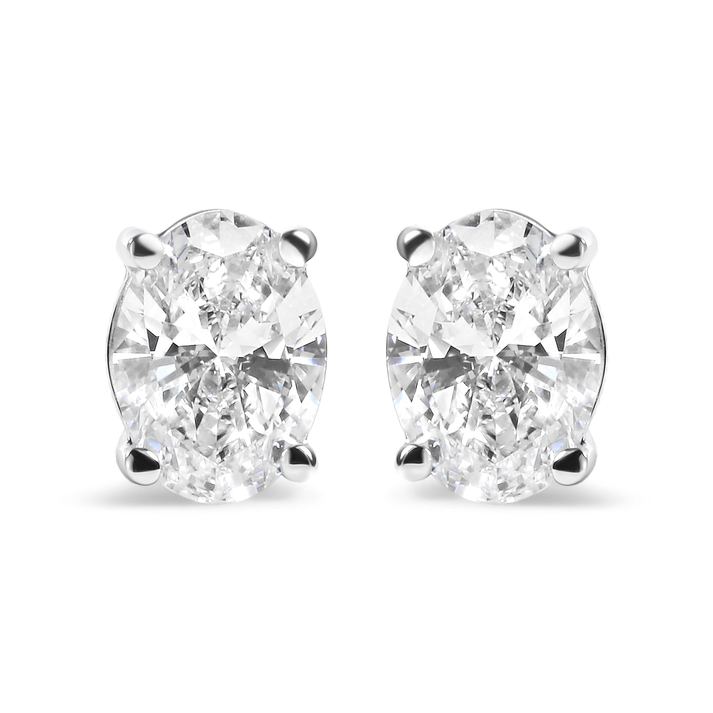 14K White Gold 3/4 Cttw Oval Shape Lab Grown Diamond Solitaire Stud Earrings (F-G Color, VS1-VS2 Clarity) Bids.com