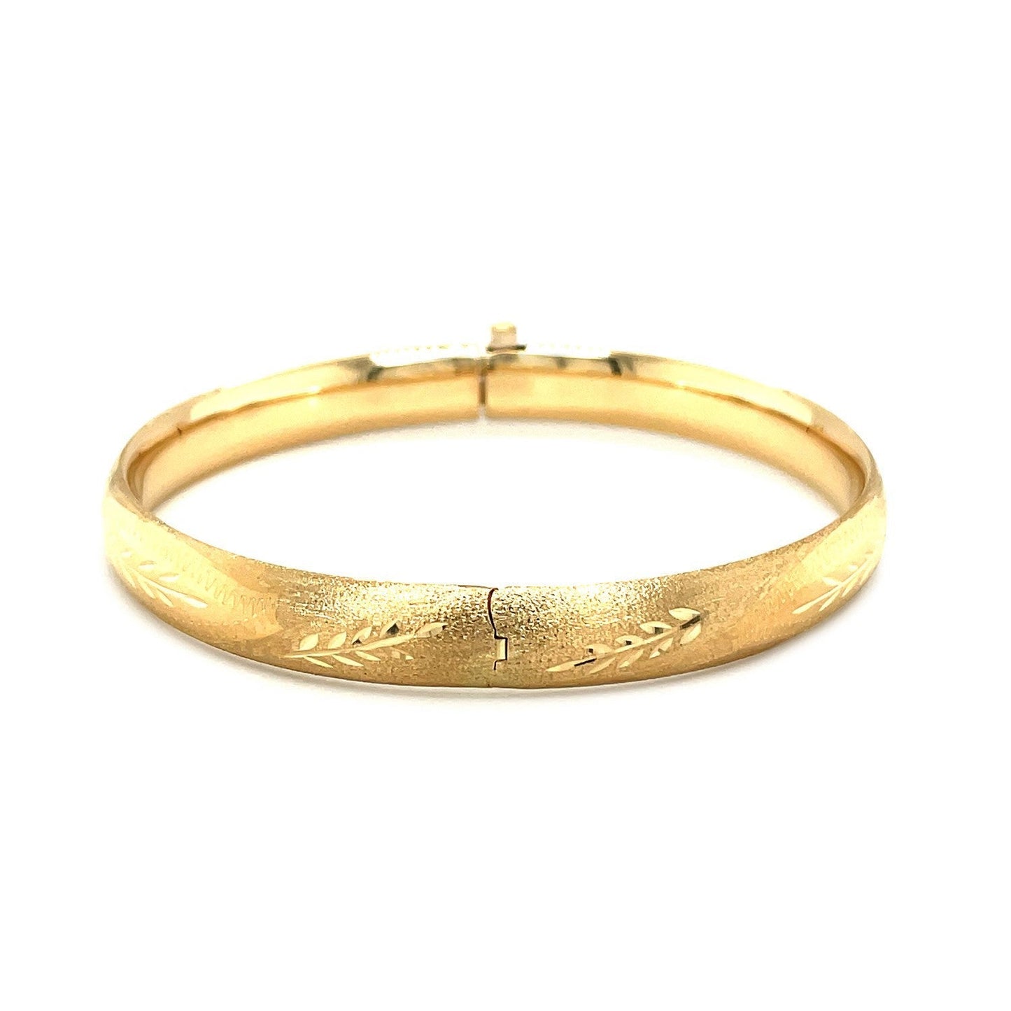 Classic Floral Carved Bangle in 14k Yellow Gold (8.0mm) Bids.com