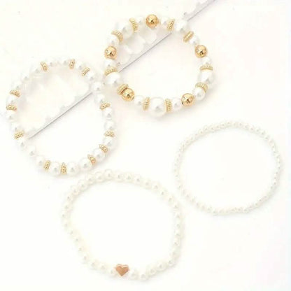 4-Pieces: Elegant White Faux Pearls Beaded Handmade Hand String Jewelry Set DailySale