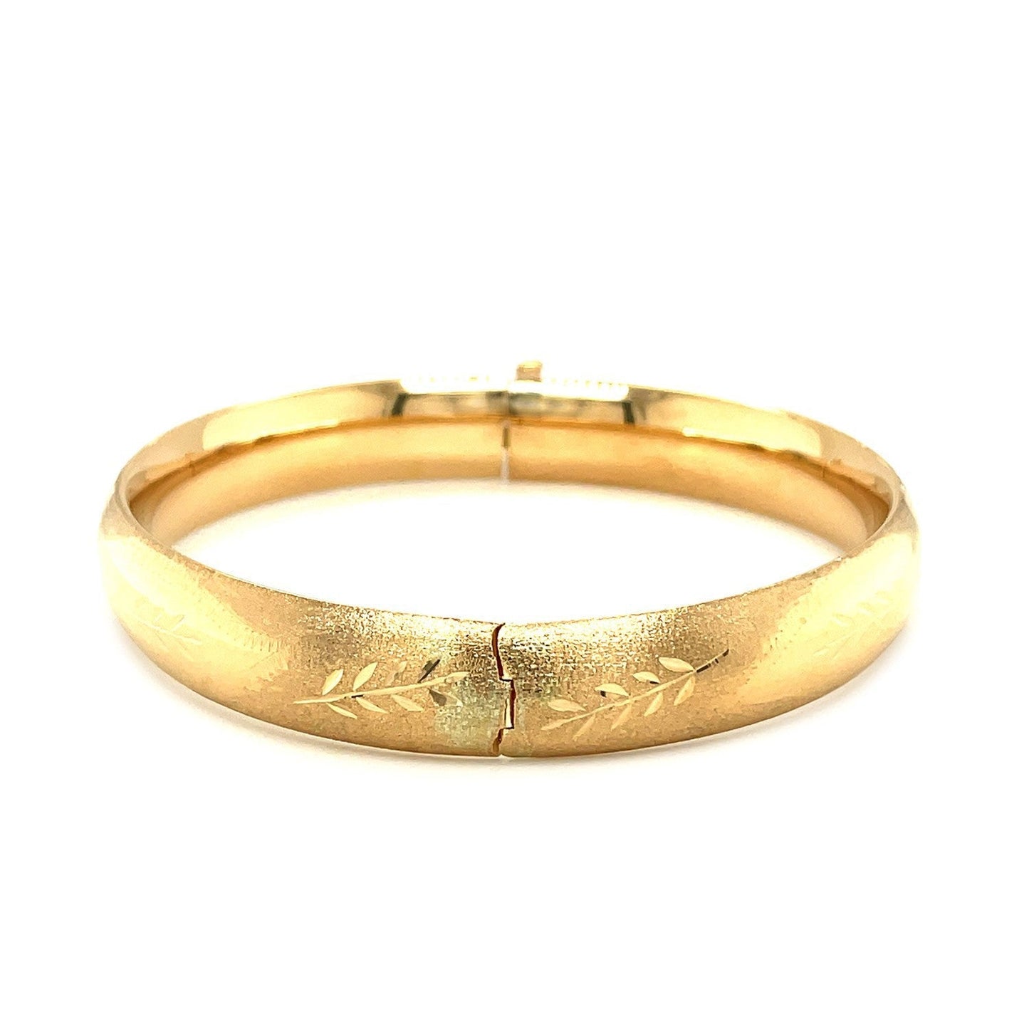 Classic Floral Carved Bangle in 14k Yellow Gold (10.0mm) Bids.com