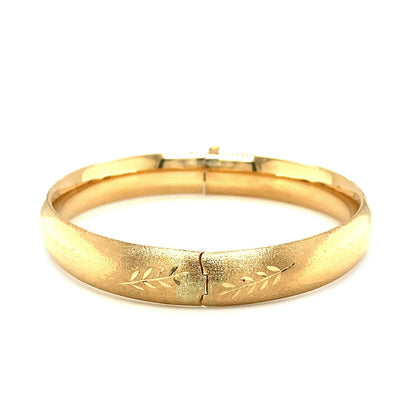 Classic Floral Carved Bangle in 14k Yellow Gold (10.0mm) Bids.com