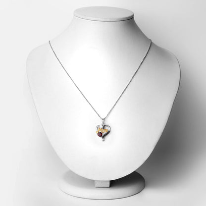 0.55 Carat Genuine Garnet and Black Spinel .925 Sterling Silver Pendant Bids.com