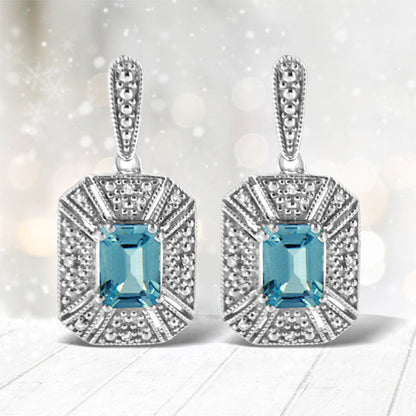 .925 Sterling Silver 7x5MM Emerald Shape Blue Topaz and Diamond Accent Art Deco Halo Style Drop and Dangle Earrings (I-J Color, I1-I2 Clarity) Bids.com