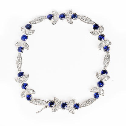 18K White Gold 1 3/4 Cttw Diamond and 3x3mm Round Blue Sapphire Gemstone Floral Link Bracelet (G-H Color, SI1-SI2 Clarity) - Size 7" Bids.com