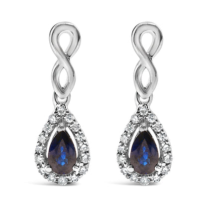 10K White Gold Pear Cut Blue Sapphire and 1/7 Cttw Diamond Infinity Drop and Dangle Earrings (I-J Color, I1-I2 Clarity) Bids.com