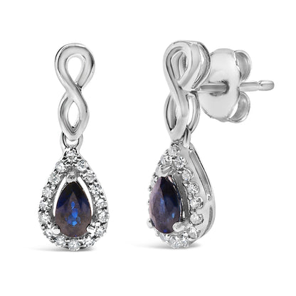 10K White Gold Pear Cut Blue Sapphire and 1/7 Cttw Diamond Infinity Drop and Dangle Earrings (I-J Color, I1-I2 Clarity) Bids.com