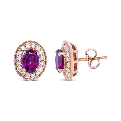 14K Rose Gold 7x5mm Oval Cut Garnet and 3/8 Cttw Round Diamond Halo Stud Earrings (G-H Color, SI1-SI2 Clarity) Bids.com