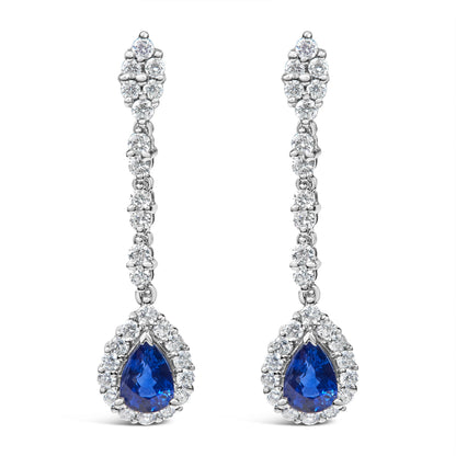18K White Gold 1 3/5 Cttw Diamond and 7X5 MM Pear Shaped Blue Sapphire 1 1/3 Inch Drop and Dangle Halo Earrings (G-H Color, VS1-VS2 Clarity) Bids.com