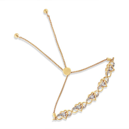 14K Yellow Gold Plated .925 Sterling Silver 1/10 Cttw Diamond Infinity Heart Shaped 4â€-10â€ Adjustable Bolo Bracelet (H-I Color, I2-I3 Clarity) Bids.com