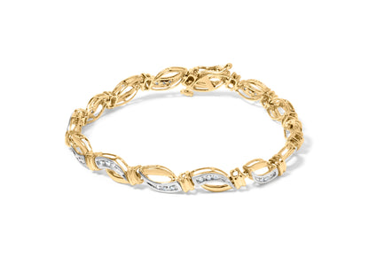 10K Yellow and White Gold 1/2 Cttw Channel Set Diamond Infinity Link 7" Tennis Bracelet (H-I Color, I1-I2 Clarity) Bids.com