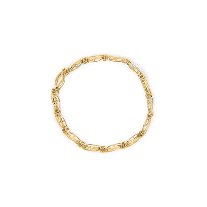 10K Yellow and White Gold 1/2 Cttw Channel Set Diamond Infinity Link 7" Tennis Bracelet (H-I Color, I1-I2 Clarity) Bids.com