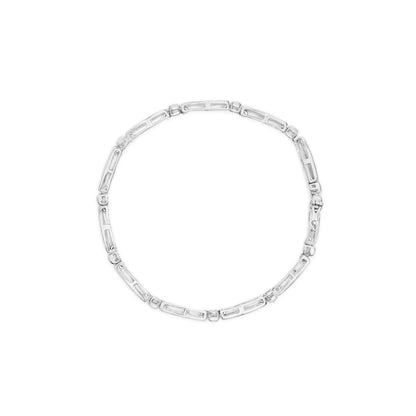 14K White Gold 1-1/2 Cttw Round Brilliant-Cut & Baguette Cut Diamond Bezel and Tapered Link 7" Tennis Bracelet (H-I Color, I1-I2 Clarity) Bids.com