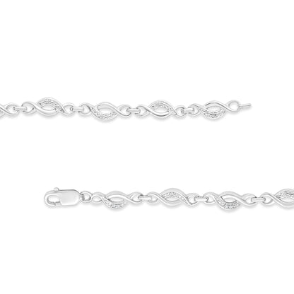 .925 Sterling Silver Prong Set Diamond Accent Curved Spiral Link Bracelet (I-J Color, I3 Clarity) - 7.25" Bids.com