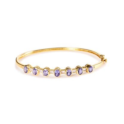 14K Yellow Gold Alternating Bezel Set 5MM Oval Shaped Tanzanite and 1/5 Cttw Diamond Bangle Bracelet (H-I Color, VS2-SI1 Clarity) - Fit's wrists up to 7.25" Inches Bids.com
