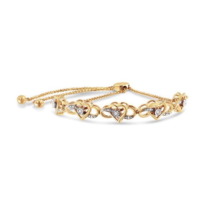 14K Yellow Gold Plated .925 Sterling Silver 1/10 Cttw Diamond Infinity Heart Shaped 4â€-10â€ Adjustable Bolo Bracelet (H-I Color, I2-I3 Clarity) Bids.com