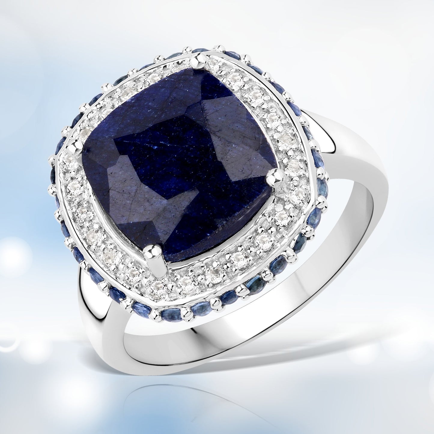 6.46 Carat Dyed Sapphire, Blue Sapphire and White Topaz .925 Sterling Silver Ring Bids.com