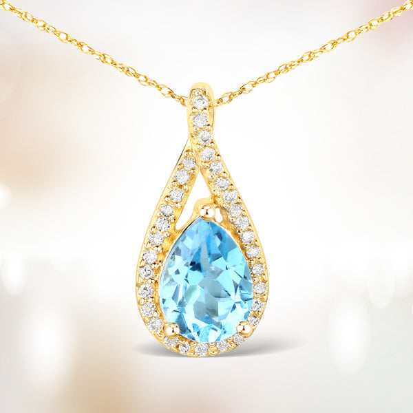 0.89 Carat Genuine Swiss Blue Topaz and White Diamond 14K Yellow Gold Pendant Bids.com