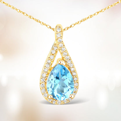 0.89 Carat Genuine Swiss Blue Topaz and White Diamond 14K Yellow Gold Pendant Bids.com