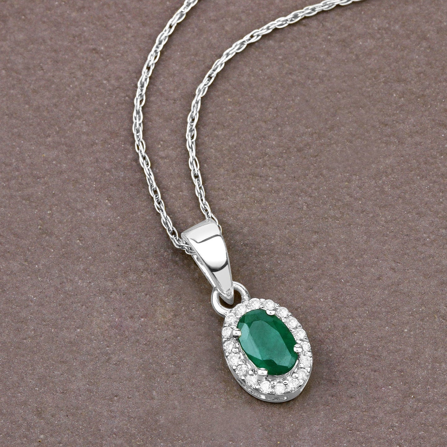 0.81 Carat Genuine Zambian Emerald and White Diamond 14K White Gold Pendant Bids.com