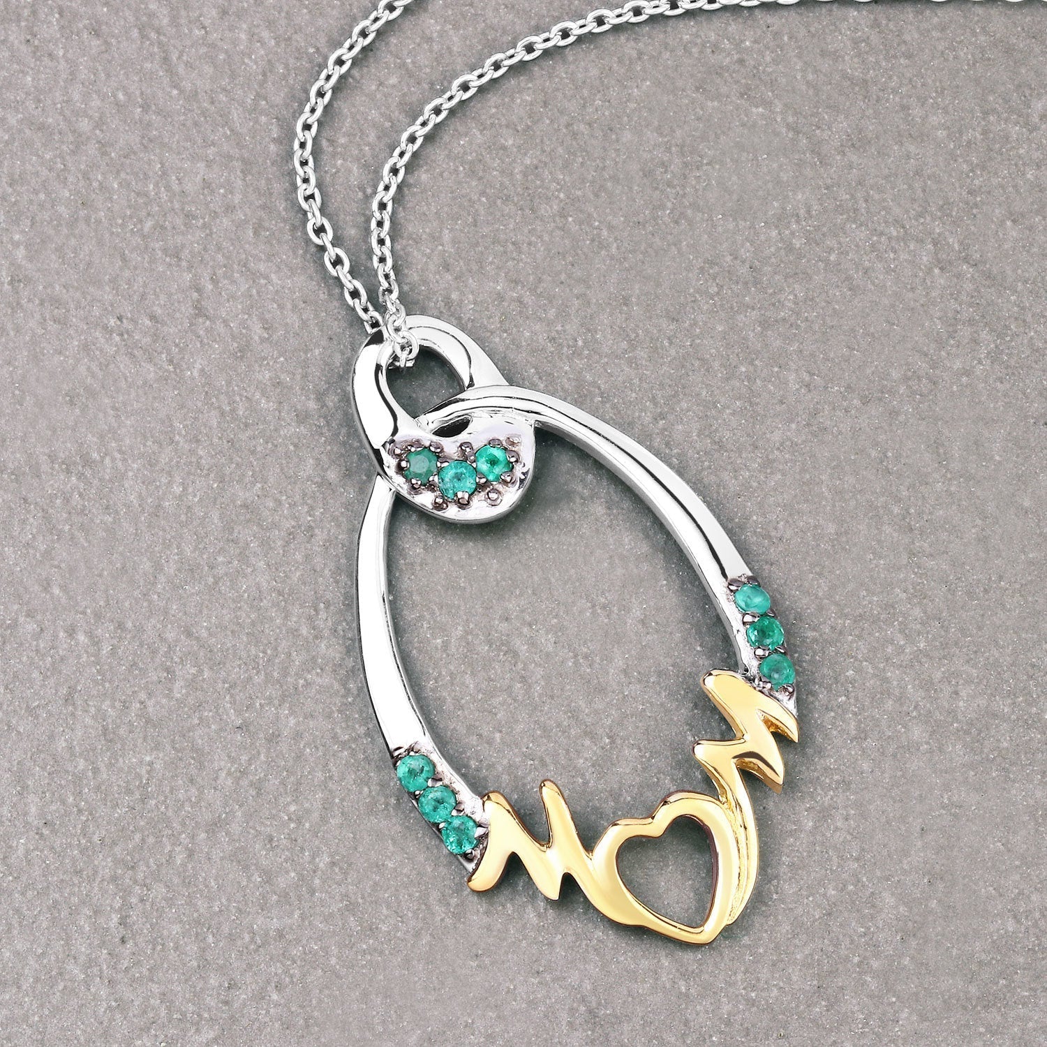 0.15 Carat Genuine Emerald .925 Sterling Silver Pendant Bids.com