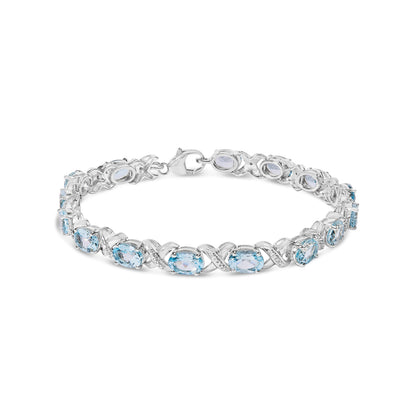 .925 Sterling Silver 16.0 Cttw Oval Blue Topaz and Diamond Accent Tennis X Link Bracelet (I-J Color, I1-I2 Clarity) - Size 7" Inch Bids.com