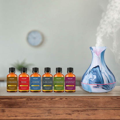 7-Piece Set: Hydro Dipped Ultrasonic Aromatherapy Diffuser With Essential Oil Gift Set DailySale