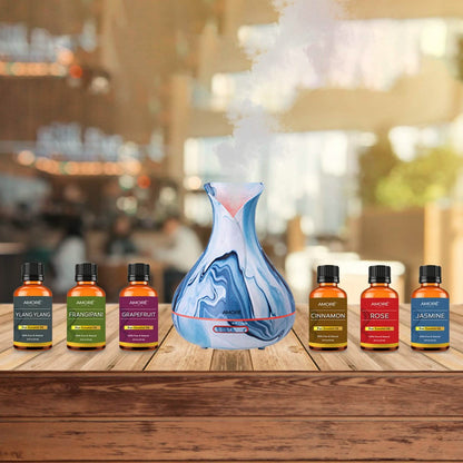 7-Piece Set: Hydro Dipped Ultrasonic Aromatherapy Diffuser With Essential Oil Gift Set DailySale