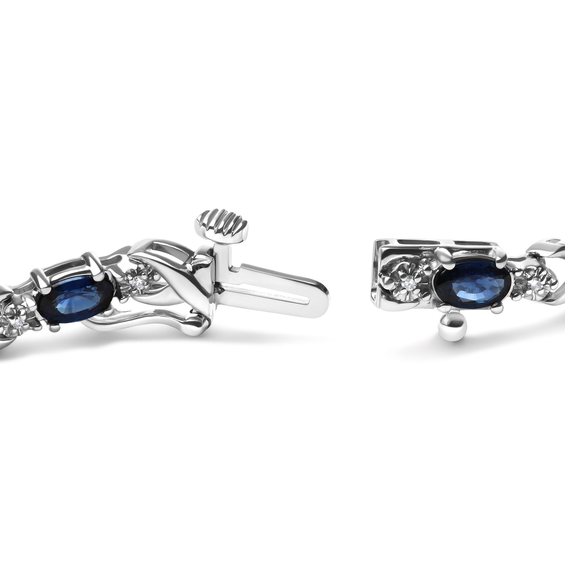 10K White Gold 5x4mm Oval Sapphire Gemstone and 1/10 Cttw Diamond Prong Set "X" Link Bracelet - Size 7" (H-I Color, SI1-SI2 Clarity) Bids.com